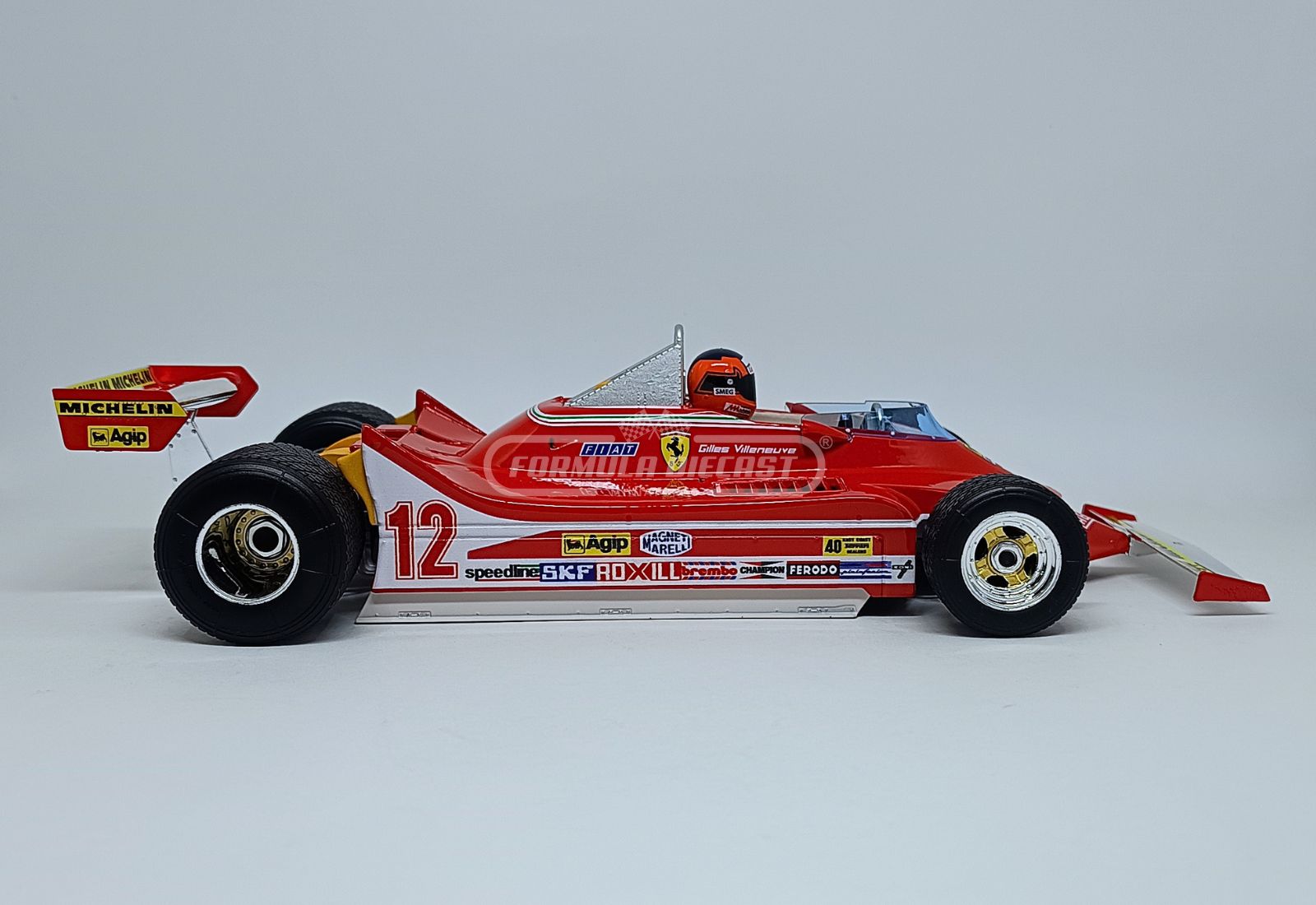 Ferrari 312T4 #12 G. Villeneuve - Vencedor GP EUA Watkins Glen - F1 1979 - 1:18 Bburago - 4