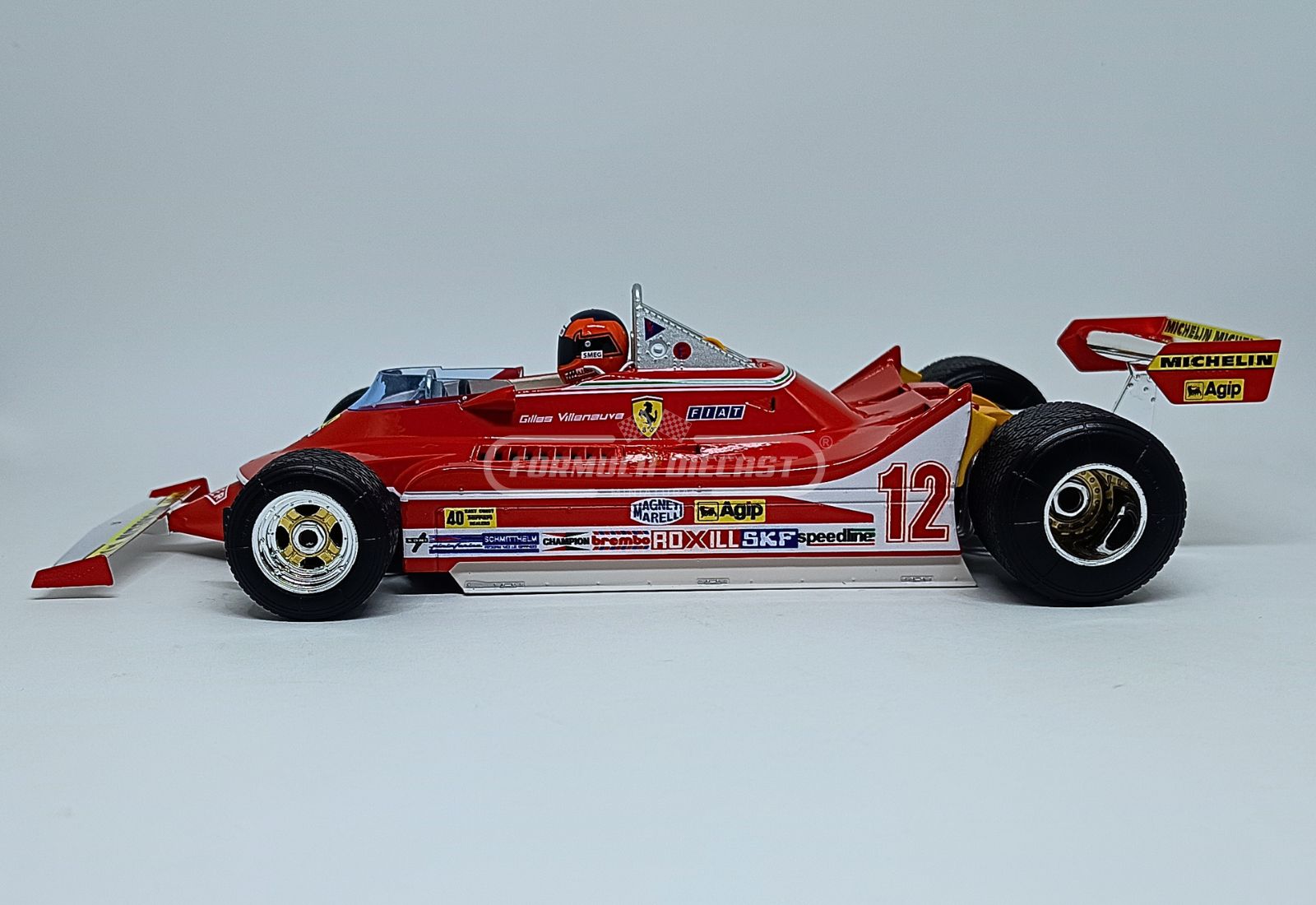 Ferrari 312T4 #12 G. Villeneuve - Vencedor GP EUA Watkins Glen - F1 1979 - 1:18 Bburago - 6